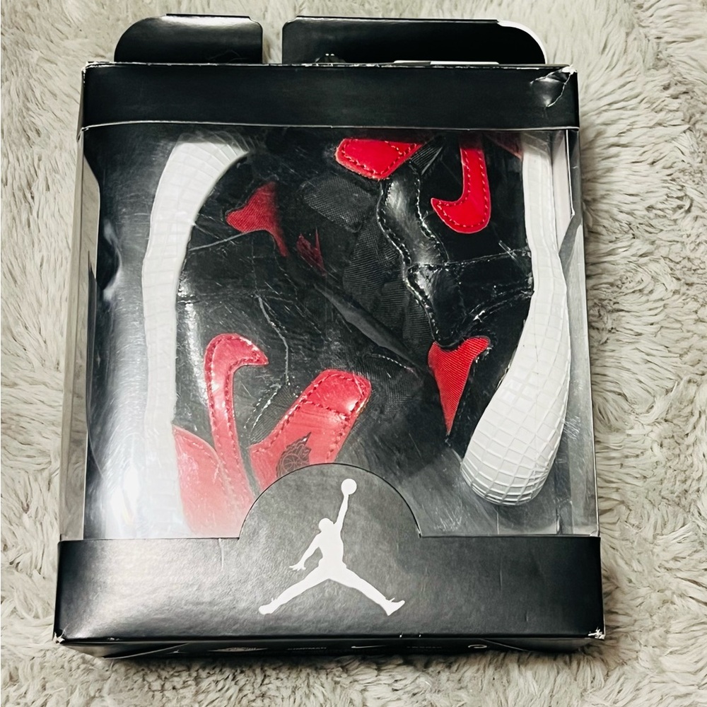 Black and red Jordans